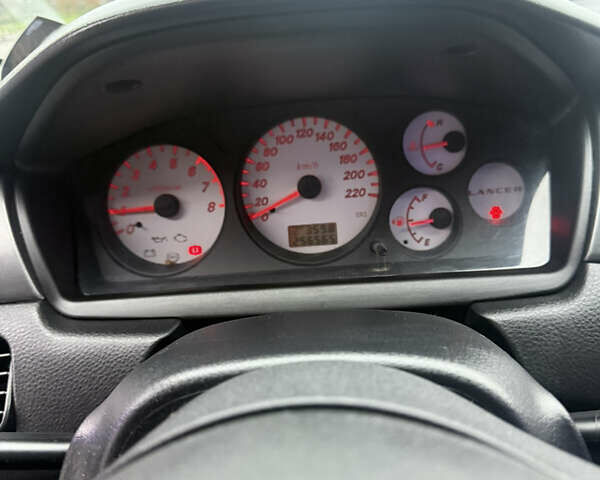 Чорний Міцубісі Lancer, об'ємом двигуна 1.58 л та пробігом 256 тис. км за 3700 $, фото 15 на Automoto.ua