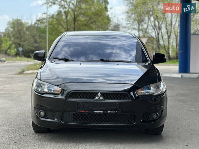 Чорний Міцубісі Lancer, об'ємом двигуна 2 л та пробігом 192 тис. км за 6500 $, фото 3 на Automoto.ua