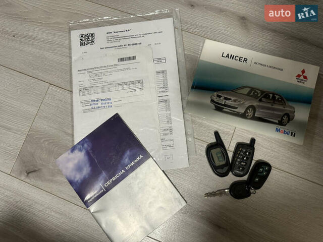 Чорний Міцубісі Lancer, об'ємом двигуна 1.6 л та пробігом 270 тис. км за 4500 $, фото 14 на Automoto.ua