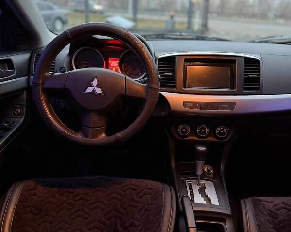 Черный Мицубиси Лансер, объемом двигателя 1.5 л и пробегом 245 тыс. км за 4499 $, фото 7 на Automoto.ua