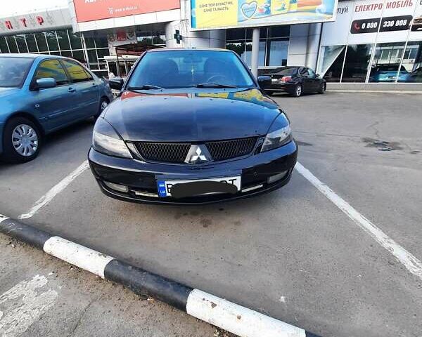 Чорний Міцубісі Lancer, об'ємом двигуна 1.6 л та пробігом 204 тис. км за 4200 $, фото 10 на Automoto.ua