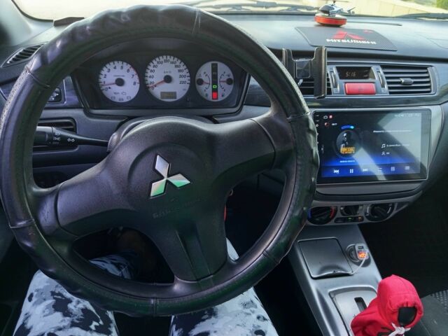 Чорний Міцубісі Lancer, об'ємом двигуна 1.6 л та пробігом 3 тис. км за 4500 $, фото 9 на Automoto.ua