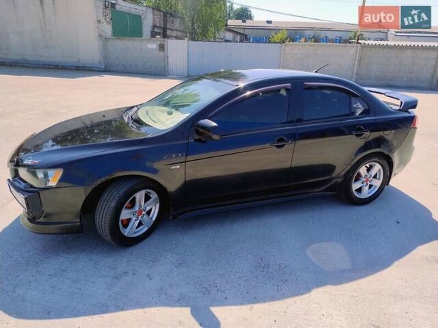 Чорний Міцубісі Lancer, об'ємом двигуна 2 л та пробігом 268 тис. км за 5000 $, фото 3 на Automoto.ua