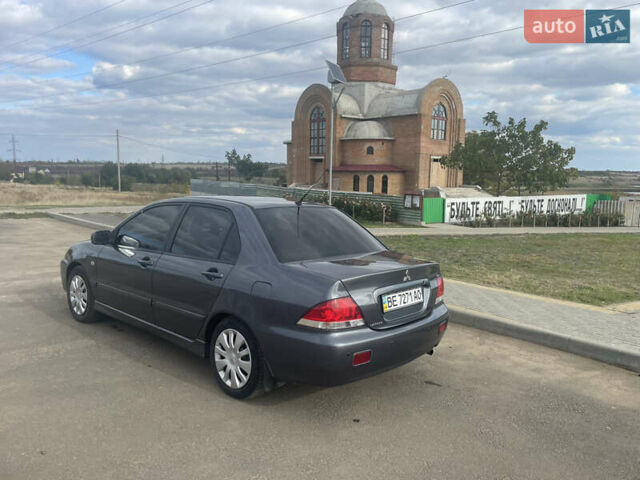 Чорний Міцубісі Lancer, об'ємом двигуна 1.6 л та пробігом 162 тис. км за 4650 $, фото 4 на Automoto.ua