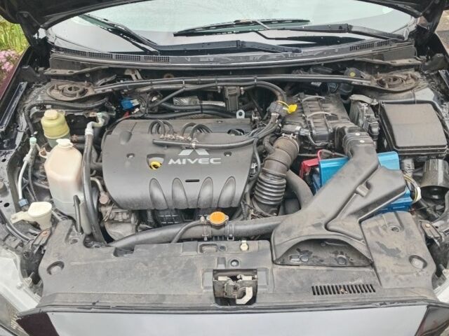 Чорний Міцубісі Lancer, об'ємом двигуна 2 л та пробігом 273 тис. км за 7100 $, фото 8 на Automoto.ua