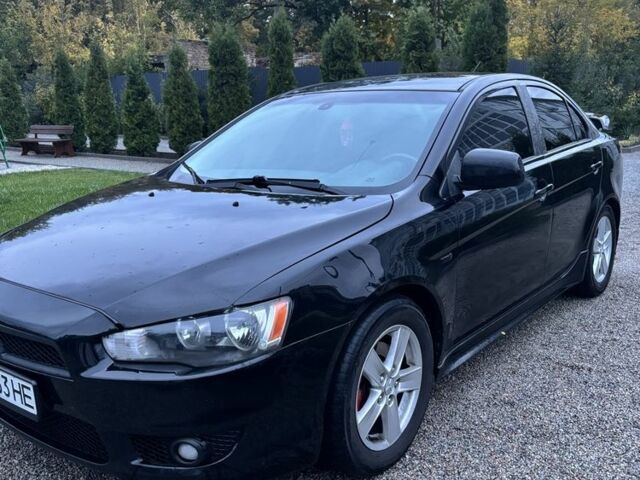Чорний Міцубісі Lancer, об'ємом двигуна 2 л та пробігом 300 тис. км за 6185 $, фото 1 на Automoto.ua