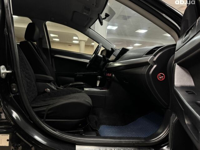 Черный Мицубиси Лансер, объемом двигателя 0 л и пробегом 201 тыс. км за 6900 $, фото 4 на Automoto.ua