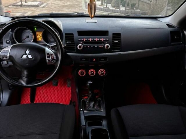Черный Мицубиси Лансер, объемом двигателя 2 л и пробегом 247 тыс. км за 4700 $, фото 9 на Automoto.ua