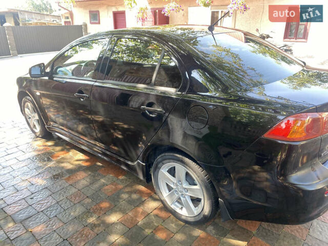 Чорний Міцубісі Lancer, об'ємом двигуна 1.5 л та пробігом 241 тис. км за 5400 $, фото 3 на Automoto.ua