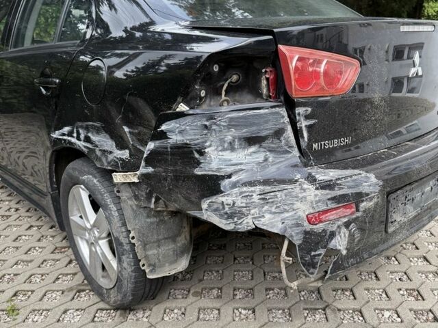 Чорний Міцубісі Lancer, об'ємом двигуна 2 л та пробігом 245 тис. км за 3500 $, фото 3 на Automoto.ua