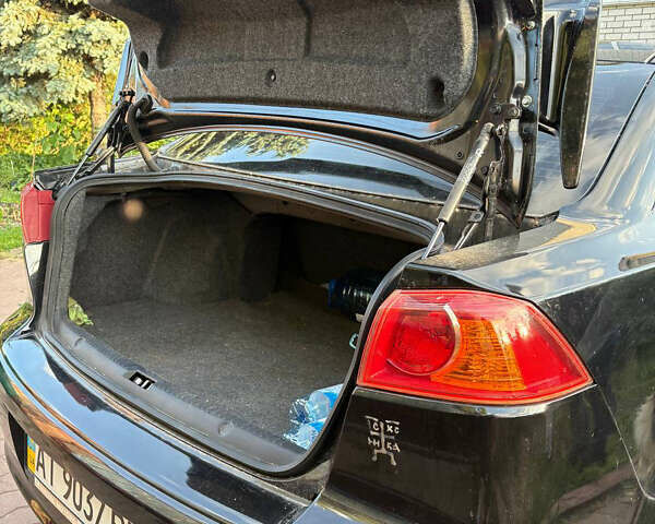 Черный Мицубиси Лансер, объемом двигателя 1.5 л и пробегом 111 тыс. км за 7500 $, фото 10 на Automoto.ua