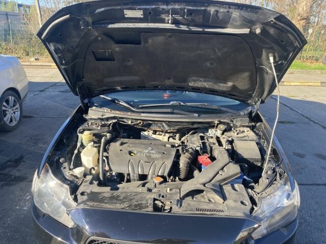 Черный Мицубиси Лансер, объемом двигателя 2 л и пробегом 372 тыс. км за 6200 $, фото 14 на Automoto.ua