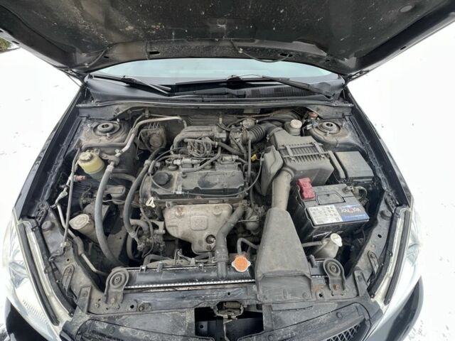 Чорний Міцубісі Lancer, об'ємом двигуна 1.6 л та пробігом 260 тис. км за 3999 $, фото 14 на Automoto.ua