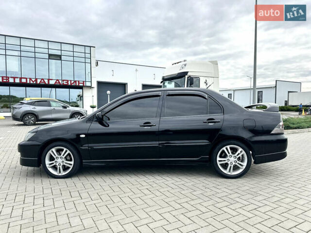 Чорний Міцубісі Lancer, об'ємом двигуна 2 л та пробігом 275 тис. км за 5300 $, фото 17 на Automoto.ua
