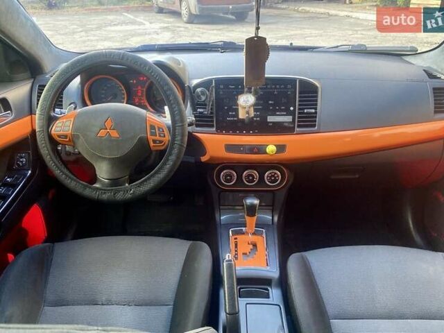 Мицубиси Лансер 2007 в Гостомель на Automoto.ua Черный Мицубиси Лансер, объемом двигателя 2 л и пробегом 258 тыс. км за 7200 $, фото 17 на Automoto.ua