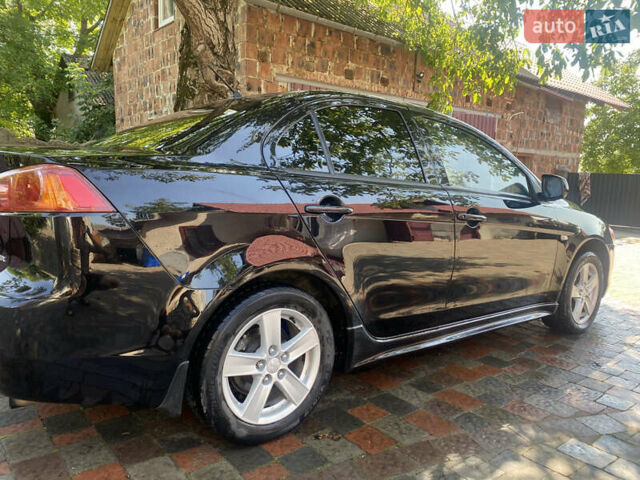 Чорний Міцубісі Lancer, об'ємом двигуна 1.5 л та пробігом 241 тис. км за 5400 $, фото 6 на Automoto.ua