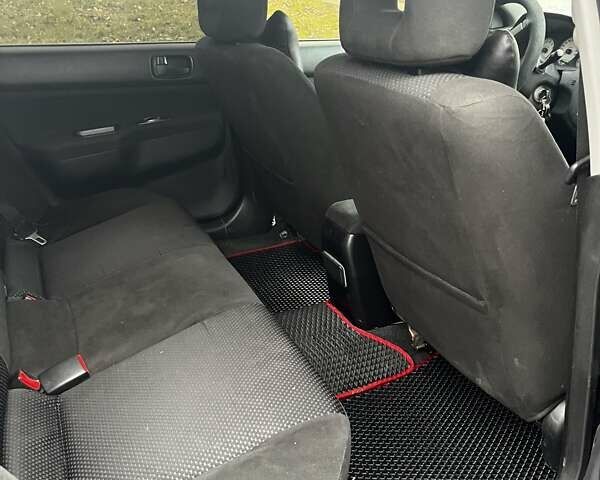 Черный Мицубиси Лансер, объемом двигателя 1.6 л и пробегом 272 тыс. км за 2800 $, фото 11 на Automoto.ua