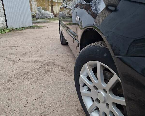 Чорний Міцубісі Lancer, об'ємом двигуна 1.6 л та пробігом 273 тис. км за 3999 $, фото 4 на Automoto.ua