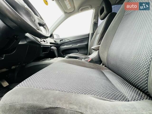 Чорний Міцубісі Lancer, об'ємом двигуна 1.6 л та пробігом 243 тис. км за 4950 $, фото 39 на Automoto.ua