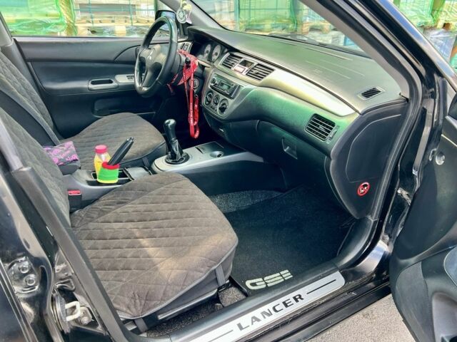 Чорний Міцубісі Lancer, об'ємом двигуна 1.6 л та пробігом 228 тис. км за 3499 $, фото 6 на Automoto.ua