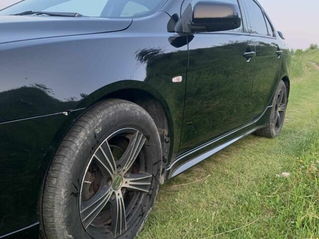 Черный Мицубиси Лансер, объемом двигателя 2 л и пробегом 208 тыс. км за 4300 $, фото 1 на Automoto.ua