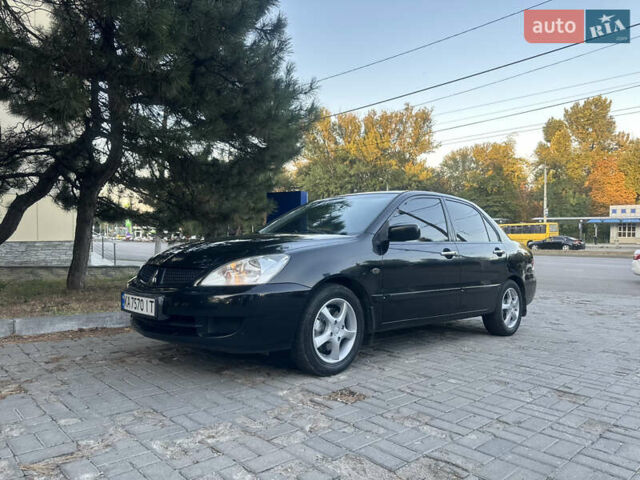 Черный Мицубиси Лансер, объемом двигателя 1.59 л и пробегом 269 тыс. км за 4999 $, фото 5 на Automoto.ua