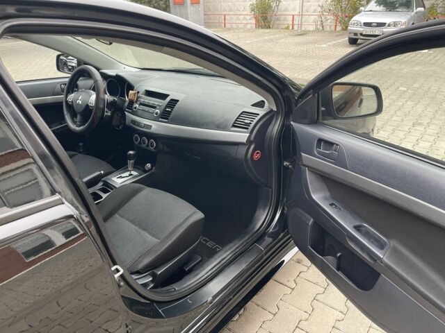 Чорний Міцубісі Lancer, об'ємом двигуна 2 л та пробігом 200 тис. км за 6800 $, фото 5 на Automoto.ua