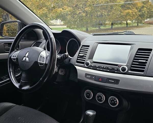 Міцубісі Lancer 2007 у Києві на Automoto.ua Чорний Міцубісі Lancer, об'ємом двигуна 2 л та пробігом 115 тис. км за 5000 $, фото 16 на Automoto.ua