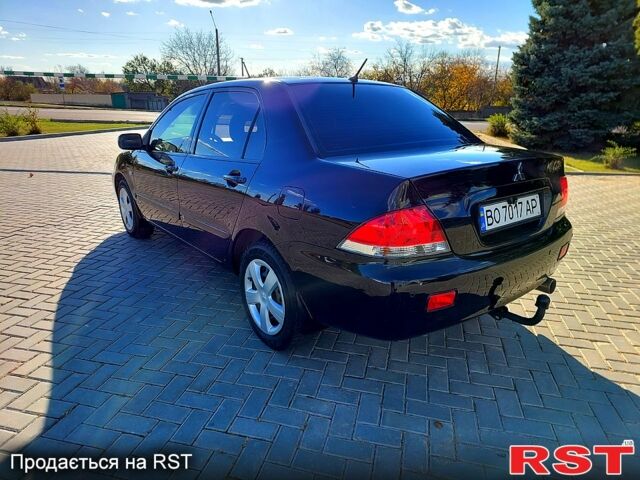 Чорний Міцубісі Lancer, об'ємом двигуна 1.6 л та пробігом 192 тис. км за 5399 $, фото 2 на Automoto.ua