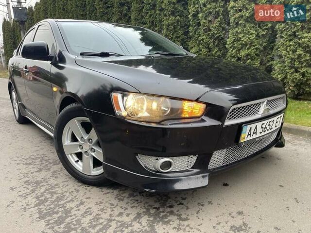 Чорний Міцубісі Lancer, об'ємом двигуна 2 л та пробігом 69 тис. км за 6200 $, фото 3 на Automoto.ua