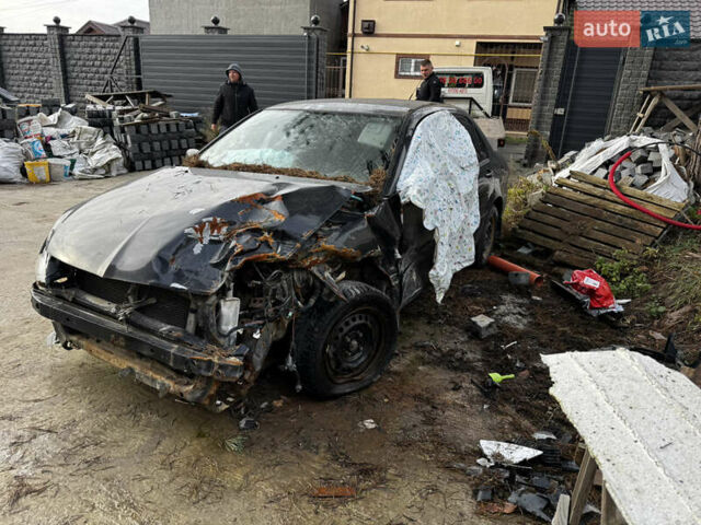 Черный Мицубиси Лансер, объемом двигателя 1.58 л и пробегом 160 тыс. км за 1299 $, фото 2 на Automoto.ua