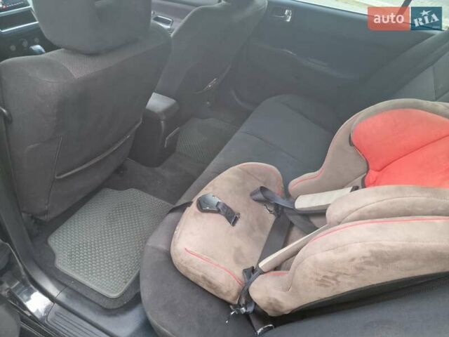 Чорний Міцубісі Lancer, об'ємом двигуна 2 л та пробігом 272 тис. км за 4750 $, фото 18 на Automoto.ua