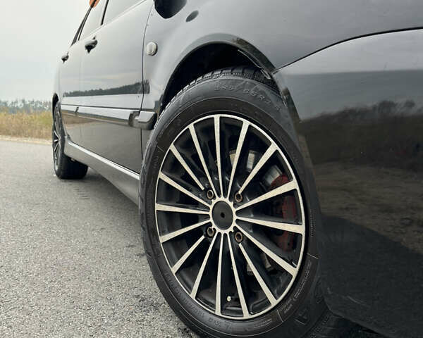 Чорний Міцубісі Lancer, об'ємом двигуна 1.6 л та пробігом 212 тис. км за 4700 $, фото 6 на Automoto.ua