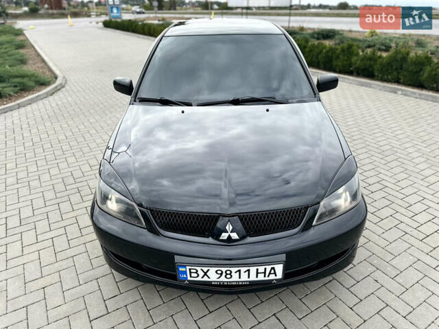 Чорний Міцубісі Lancer, об'ємом двигуна 2 л та пробігом 275 тис. км за 5300 $, фото 19 на Automoto.ua