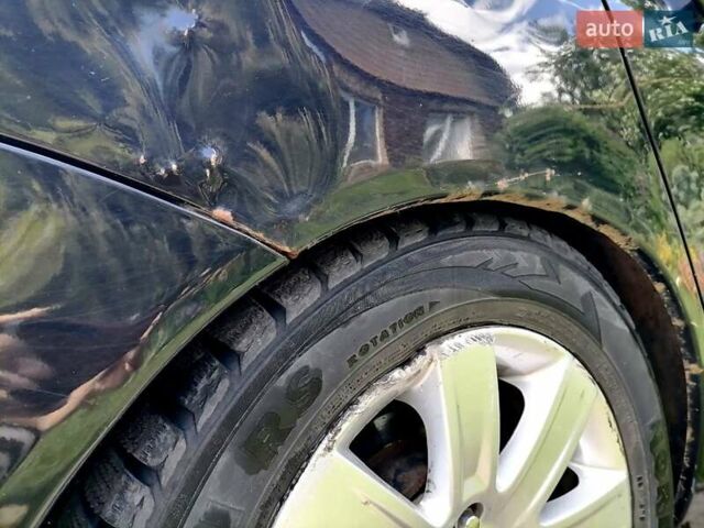 Черный Мицубиси Лансер, объемом двигателя 1.58 л и пробегом 200 тыс. км за 4000 $, фото 5 на Automoto.ua