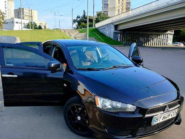 Черный Мицубиси Лансер, объемом двигателя 1.5 л и пробегом 215 тыс. км за 5600 $, фото 4 на Automoto.ua