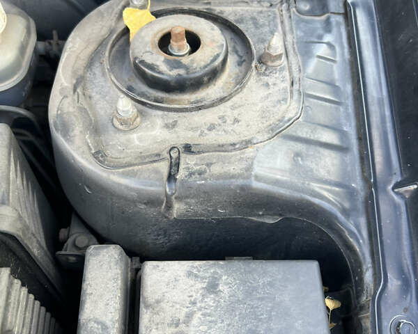 Чорний Міцубісі Lancer, об'ємом двигуна 1.58 л та пробігом 175 тис. км за 5200 $, фото 13 на Automoto.ua