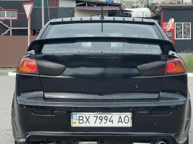 Черный Мицубиси Лансер, объемом двигателя 2 л и пробегом 350 тыс. км за 4299 $, фото 1 на Automoto.ua