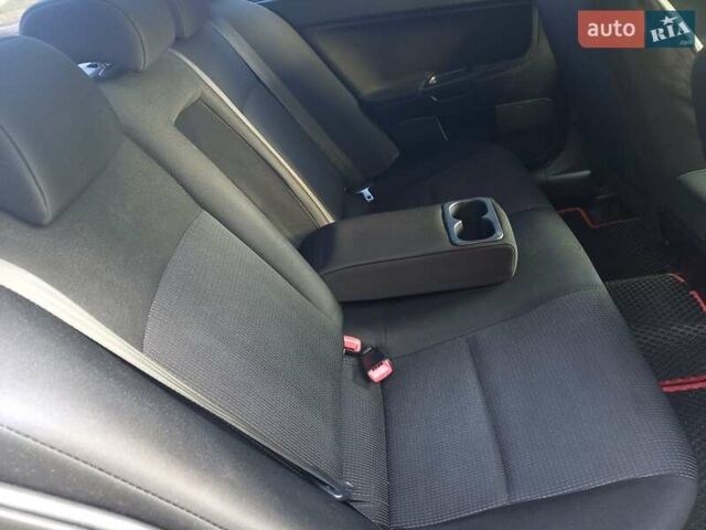 Чорний Міцубісі Lancer, об'ємом двигуна 1.5 л та пробігом 242 тис. км за 5550 $, фото 32 на Automoto.ua