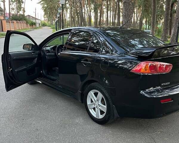 Чорний Міцубісі Lancer, об'ємом двигуна 2 л та пробігом 230 тис. км за 6800 $, фото 5 на Automoto.ua