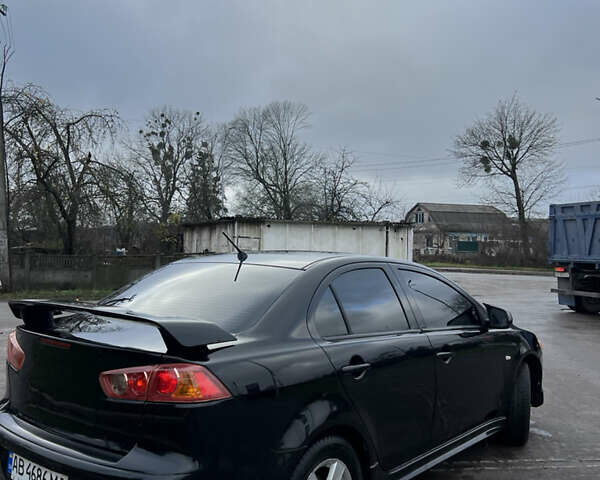 Черный Мицубиси Лансер, объемом двигателя 2 л и пробегом 350 тыс. км за 6700 $, фото 2 на Automoto.ua