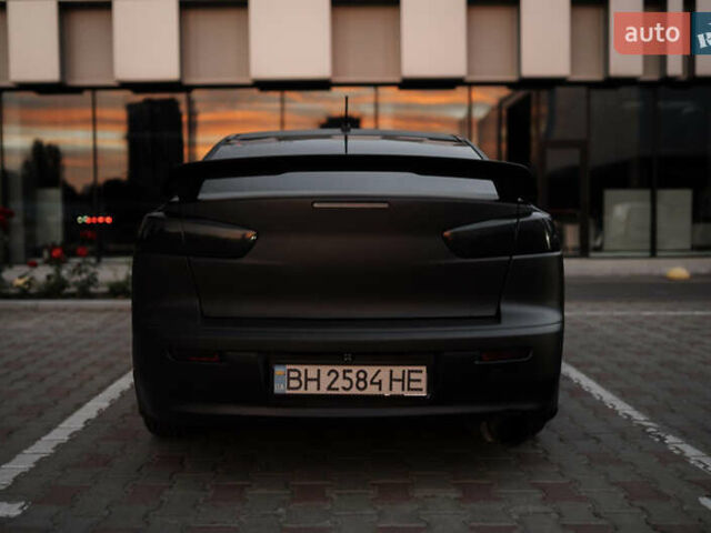 Чорний Міцубісі Lancer, об'ємом двигуна 2 л та пробігом 203 тис. км за 7000 $, фото 11 на Automoto.ua