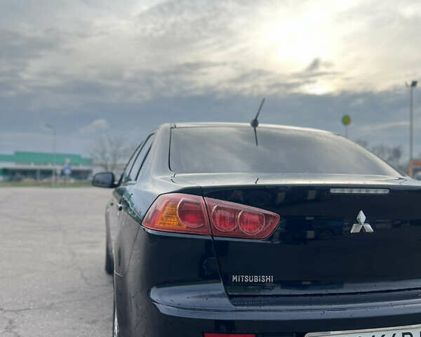 Чорний Міцубісі Lancer, об'ємом двигуна 1.5 л та пробігом 209 тис. км за 5500 $, фото 4 на Automoto.ua