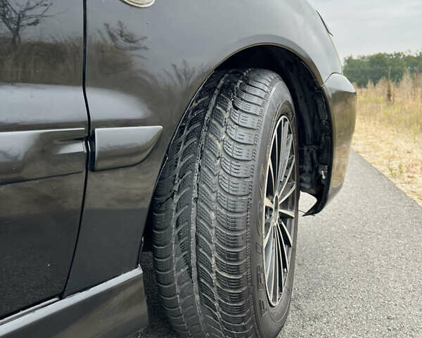Чорний Міцубісі Lancer, об'ємом двигуна 1.6 л та пробігом 212 тис. км за 4700 $, фото 4 на Automoto.ua