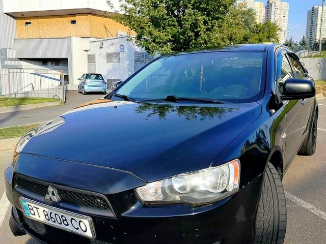 Черный Мицубиси Лансер, объемом двигателя 1.5 л и пробегом 215 тыс. км за 5600 $, фото 1 на Automoto.ua
