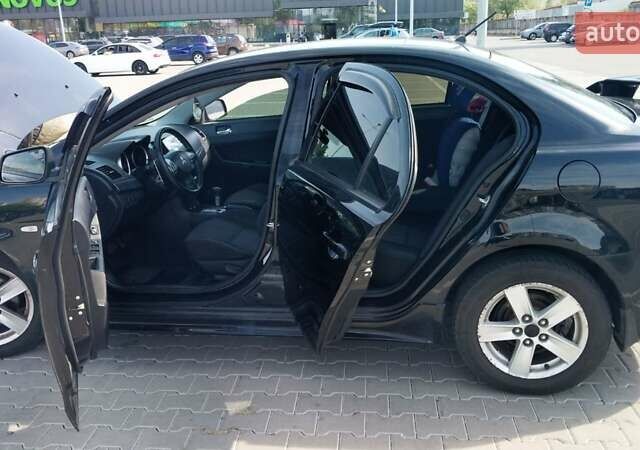 Чорний Міцубісі Lancer, об'ємом двигуна 2 л та пробігом 194 тис. км за 6500 $, фото 11 на Automoto.ua
