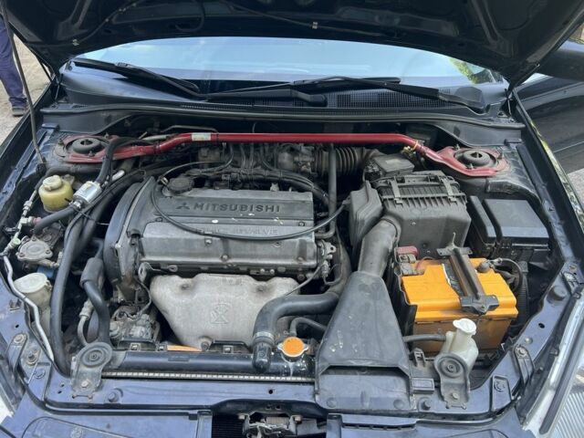 Черный Мицубиси Лансер, объемом двигателя 2 л и пробегом 240 тыс. км за 5600 $, фото 7 на Automoto.ua