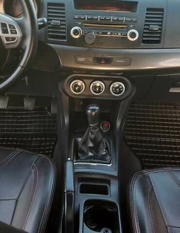 Міцубісі Lancer 2007 у Києві на Automoto.ua Чорний Міцубісі Lancer, об'ємом двигуна 2 л та пробігом 238 тис. км за 5350 $, фото 15 на Automoto.ua