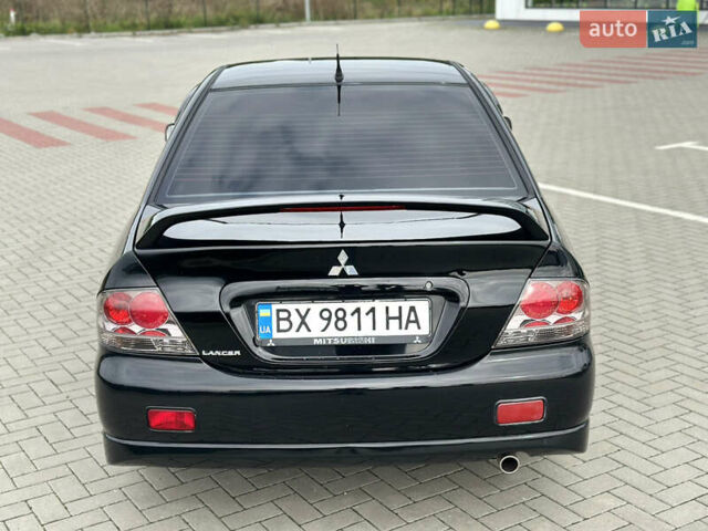 Чорний Міцубісі Lancer, об'ємом двигуна 2 л та пробігом 275 тис. км за 5300 $, фото 25 на Automoto.ua