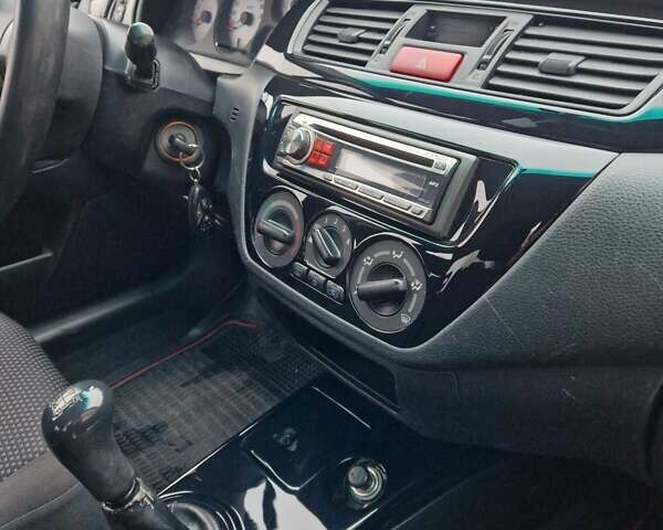 Чорний Міцубісі Lancer, об'ємом двигуна 1.6 л та пробігом 273 тис. км за 3999 $, фото 29 на Automoto.ua